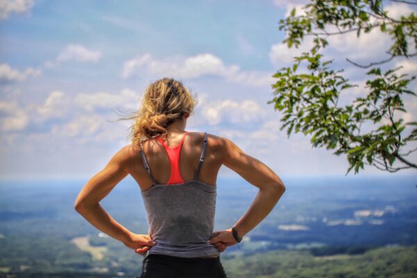 a women runner with running niggles stopped